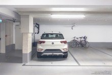 Tiefgaragenstellplatz Attraktive, barrierefreie Zweizimmerwohnung im Erdgeschoss mit Terrasse in moderner Stadtvilla
